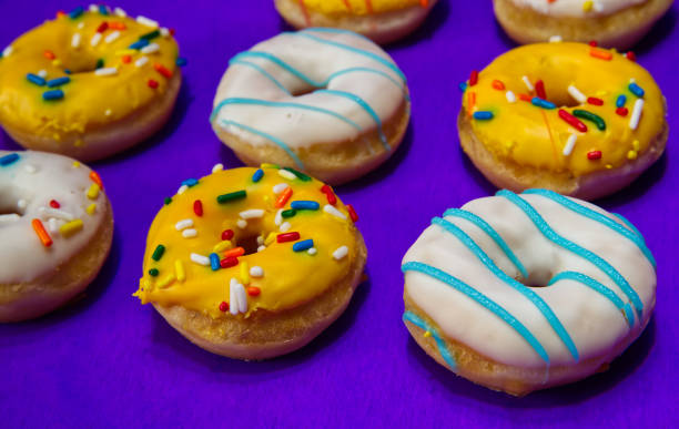 istock Close Up Of Donuts On A Purple Background 1751387633