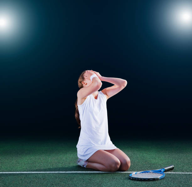 istock Tennis player crying on court 175139079