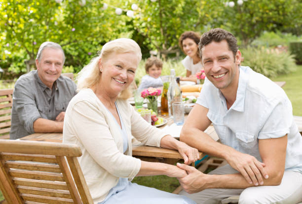 istock Mother and son smiling in backyard 175139263