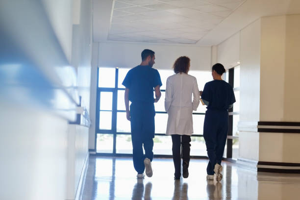 istock Hospital staff talking in hallway 175139293