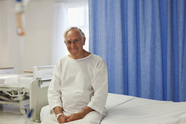 istock Older patient sitting on hospital bed 175139297