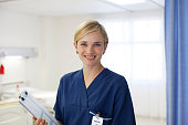 istock Nurse smiling in hospital room 175139365