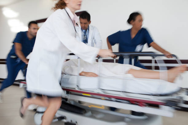 istock Hospital staff rushing patient to operating room 175139420