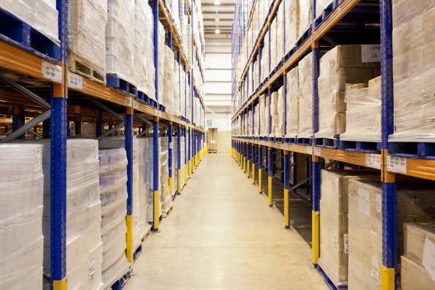 istock Stacks of boxes in aisle in warehouse 175139532