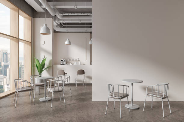 istock Beige cafe interior with bar counter and dining space, window. Mock up wall 1751395765