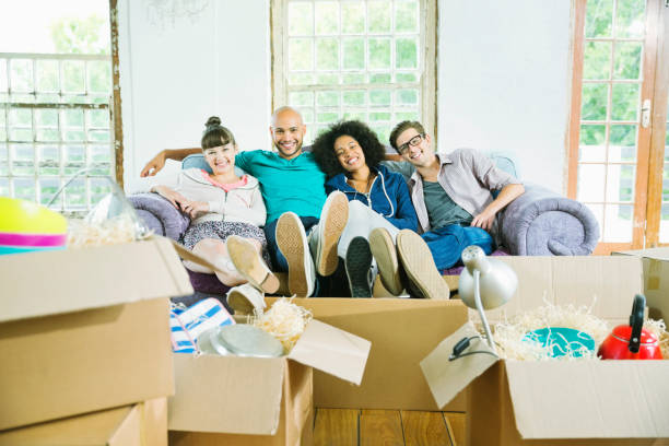 istock Friends relaxing together in new home 175139793