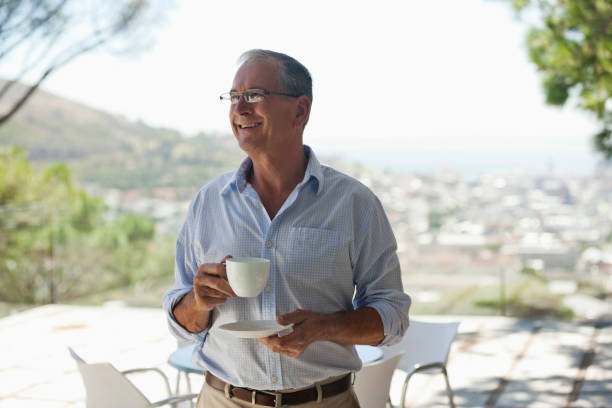 istock Man drinking cup of coffee outdoors 175139947