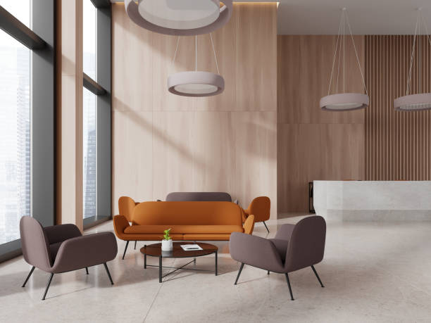 istock Stylish office interior with reception desk and chill zone, panoramic window 1751400074