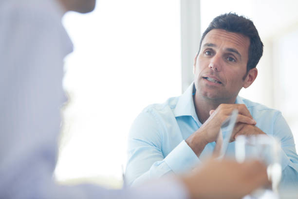 istock Businessmen talking in meeting 175140039