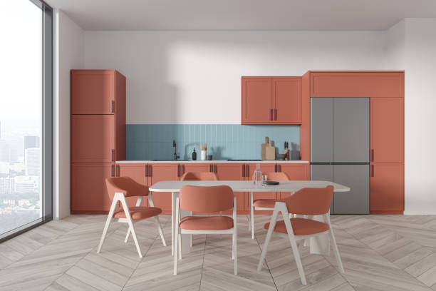 istock Cozy home kitchen interior with cooking and eating area, panoramic window 1751401692