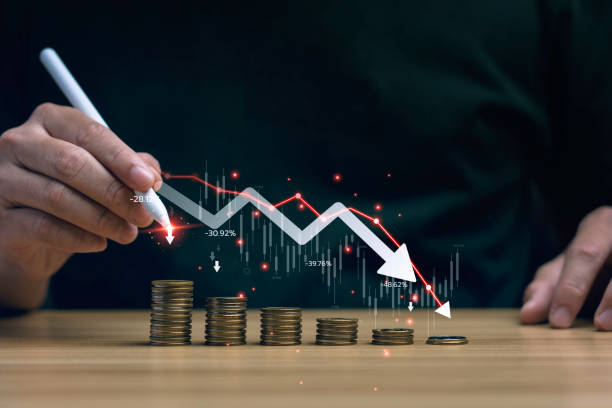 istock Economic collapse concept, businessman with falling financial graph chart due to global recession. Stock market crash, inflation, financial crisis, Falling income in GDP, capital reduction 1751402763