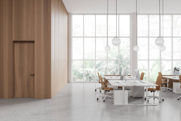 istock White and wooden open space office interior with door 1751409184