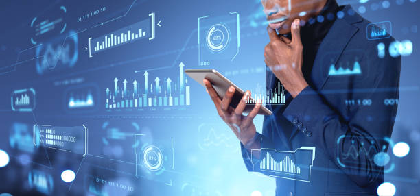 istock Thoughtful African man with tablet and digital dashboard 1751412456
