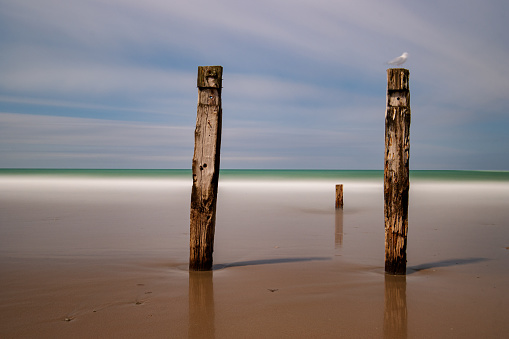 Coloured long exposure photo of wharf ruins