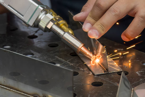 istock Close up scene the laser welding process with the sparking light. 1751446215