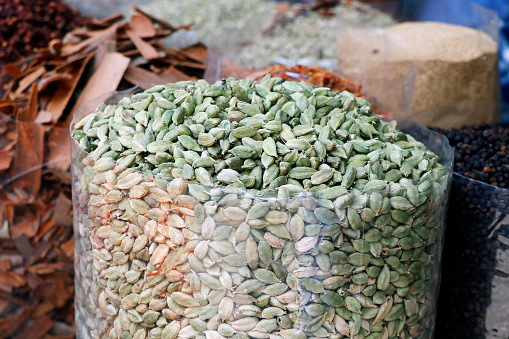 dried green cardamom in a spices stall market for sell in close up