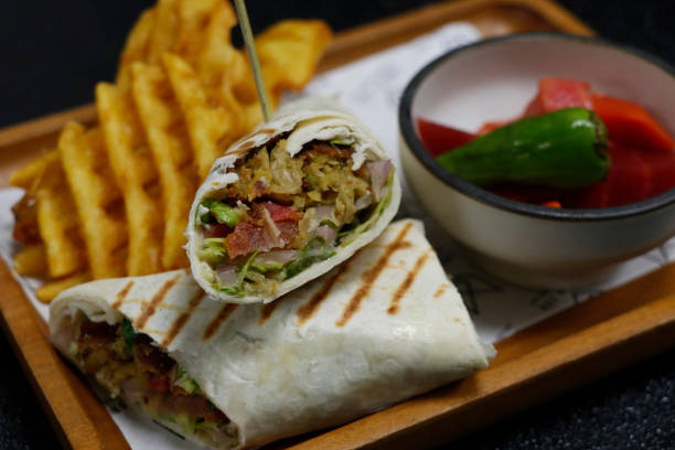 istock arabic middle eastern falafel wrap with potato chips and pickle in close up 1751505850