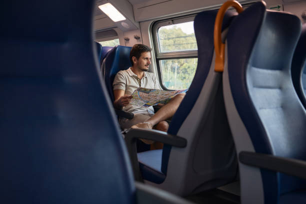 istock Young male tourist traveling by subway train 1751551626