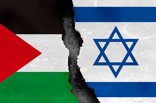 Palestinian and Israeli flags.