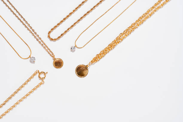 istock Set of gold chains with pendant on white background 1751584371