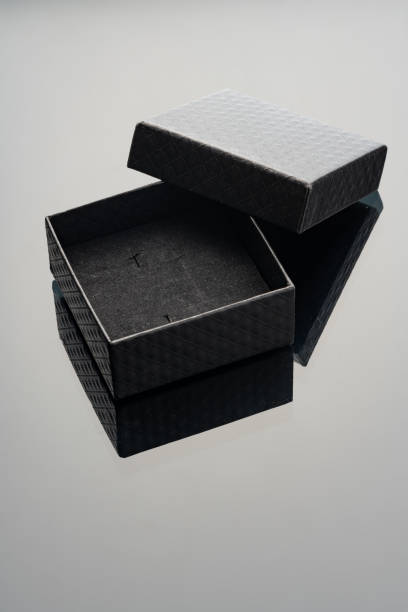 istock Empty black open jewelry box on glass background 1751585226