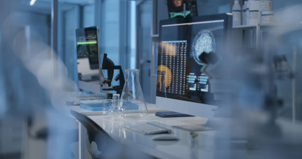 istock Empty room, science and lab with biotechnology computer, equipment and workspace with no people. Laboratory, space and table with technology for futuristic research, education or tools for scientist 1751607856