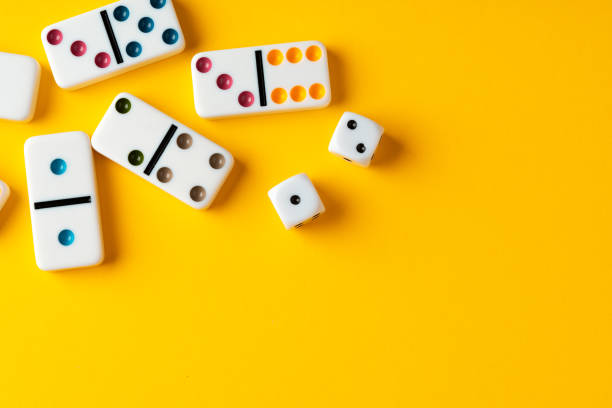 istock Domino tiles on yellow background studio shot 1751610039