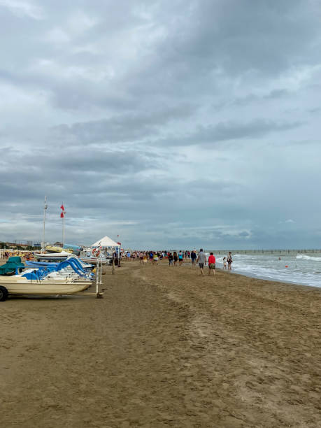 istock People walking by the sea on a stormy day 1751629912