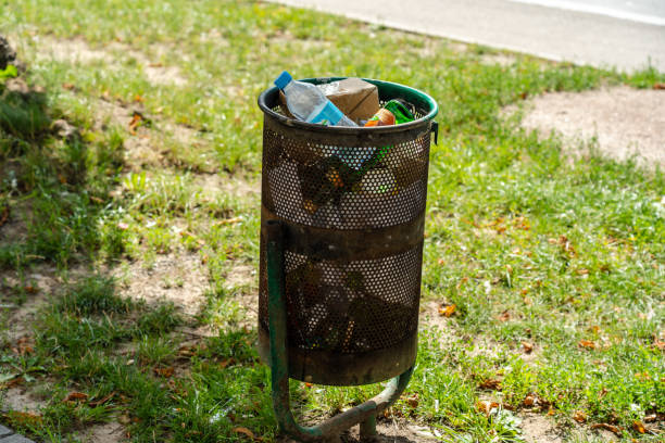 Trash cans full with rubbish in the street