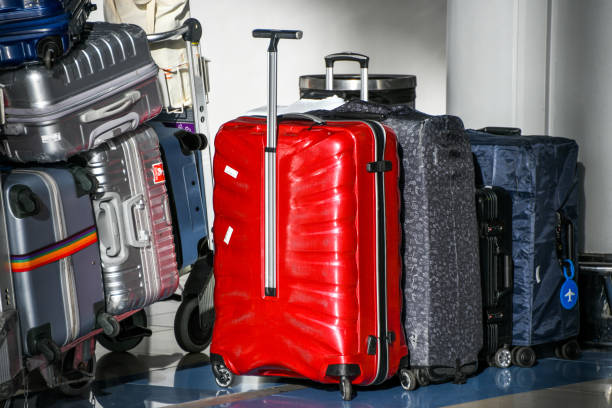 istock Suitcases on wheels in airport 1751644433
