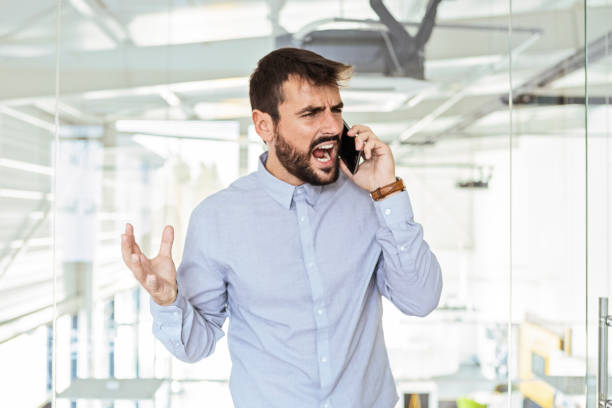 istock Businessman with his Smartphone Shouting 1751646924
