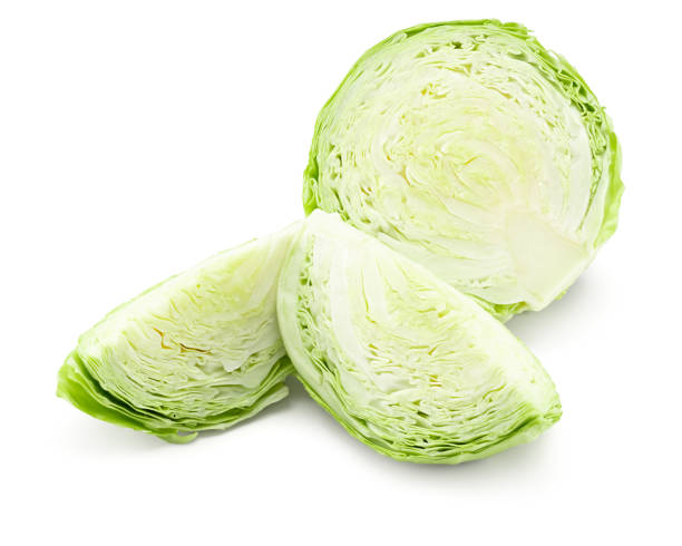istock Cut of green cabbage isolated on white background. clipping path 1751649388