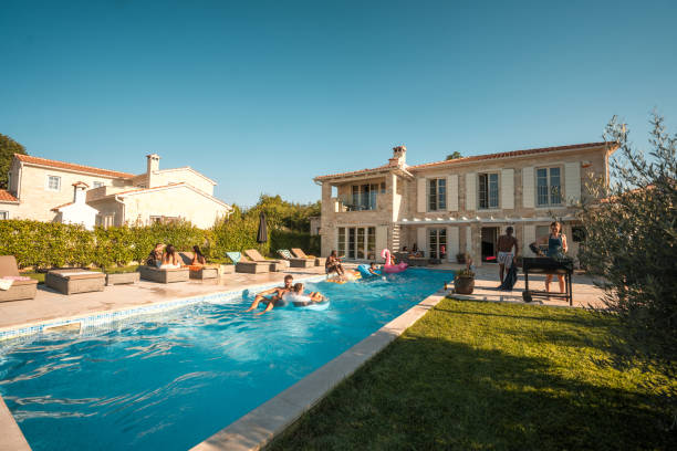 istock Friends Enjoying a Villa Pool Party 1751652137