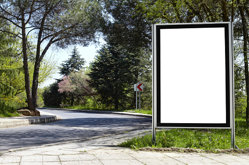 Blank billboard on street-Clipping path of billboard included