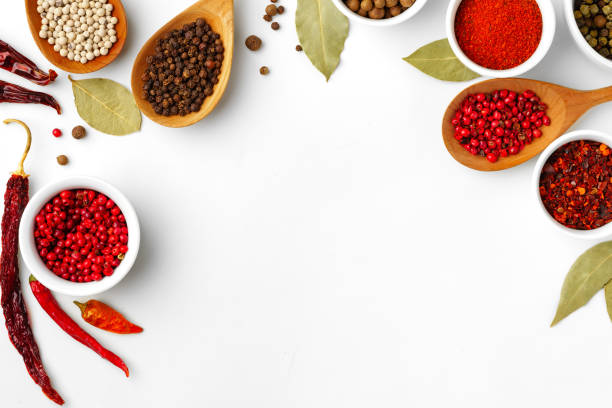 istock Composition with different aromatic spices in bowls and wooden spoons on white background 1751662254