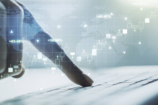 istock Abstract creative financial graph with world map and with hands typing on laptop on background, forex and investment concept. Multiexposure 1751695118