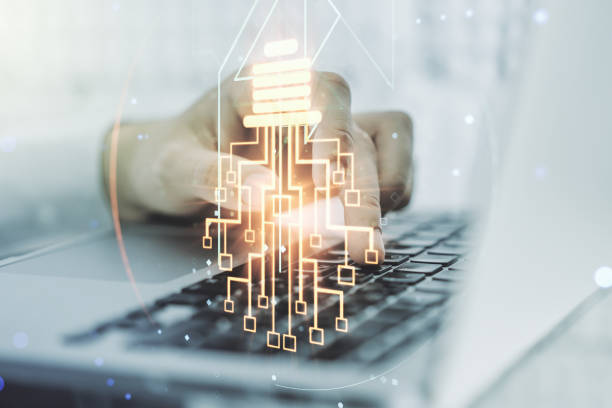 istock Double exposure of creative light bulb hologram with chip and hands typing on laptop on background, idea and brainstorming concept 1751695123
