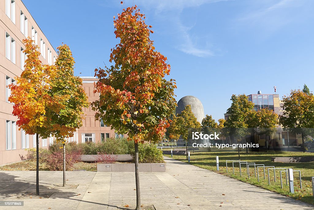 Modern facade with trees "Modern facade with colorful trees in autumn. (Was seen in Berlin-Adlershof.For more autumn impressions, please look here:" Architecture Stock Photo