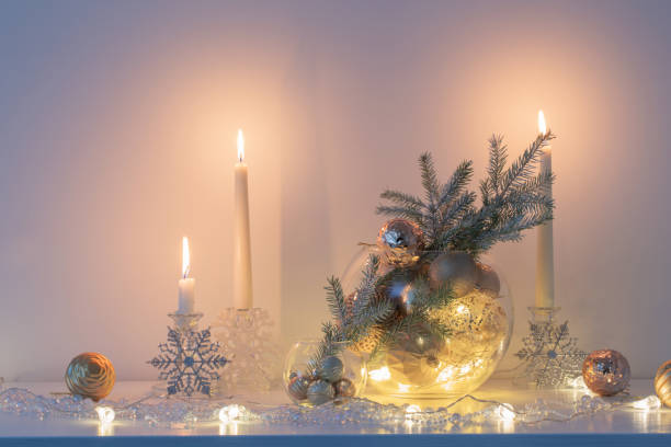 istock christmas decoration with burning candles in white interior 1751724183