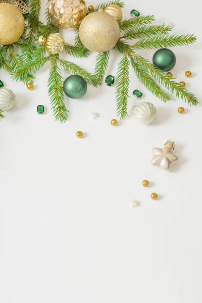 istock golden and green  christmas decorations  on white  background 1751724733