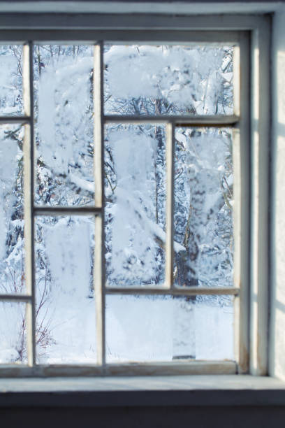 istock old window with snowy beautiful landscape 1751724761