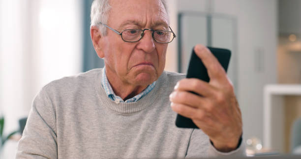 istock Phone problem, senior man and reading retirement email, bad communication or social media post, website or info. Cellphone risk, elderly person and check home mistake news, message fail or web crisis 1751725311