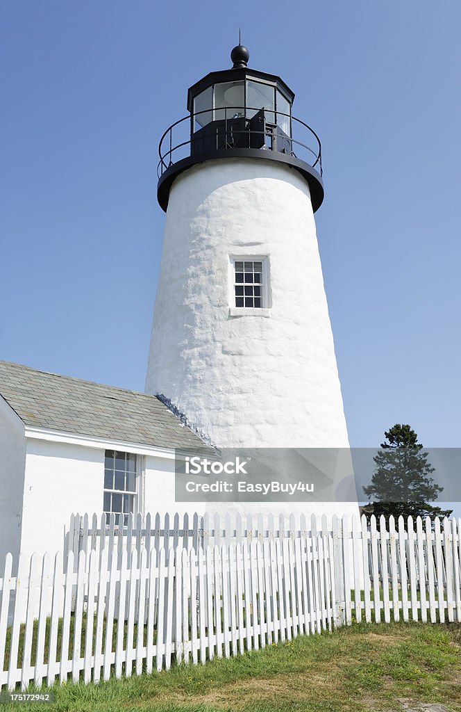 White lighthouse "White lighthouse with wooden fences on a clear blue sky (Pemaquid Point lighthouse, Maine, United States). Best of Maine and New England in lightbox below..." Building Exterior Stock Photo