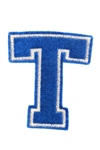 varsity in stile college lettera t - alphabet blue felt capital letter foto e immagini stock