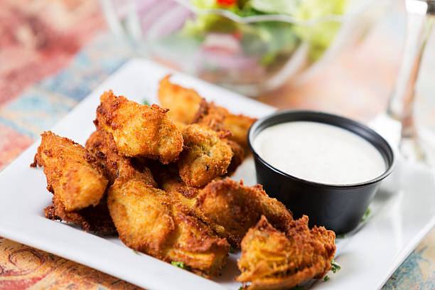 istock Appetizer: deep fried artichoke hearts with blue cheese dip 175173803