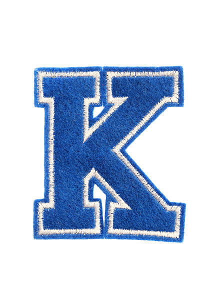 varsity in stile college lettera k - alphabet blue felt capital letter foto e immagini stock