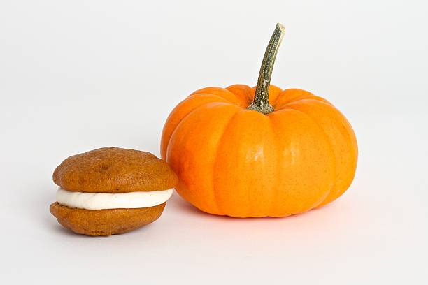 Pumpkin and whoopie pie stock photo