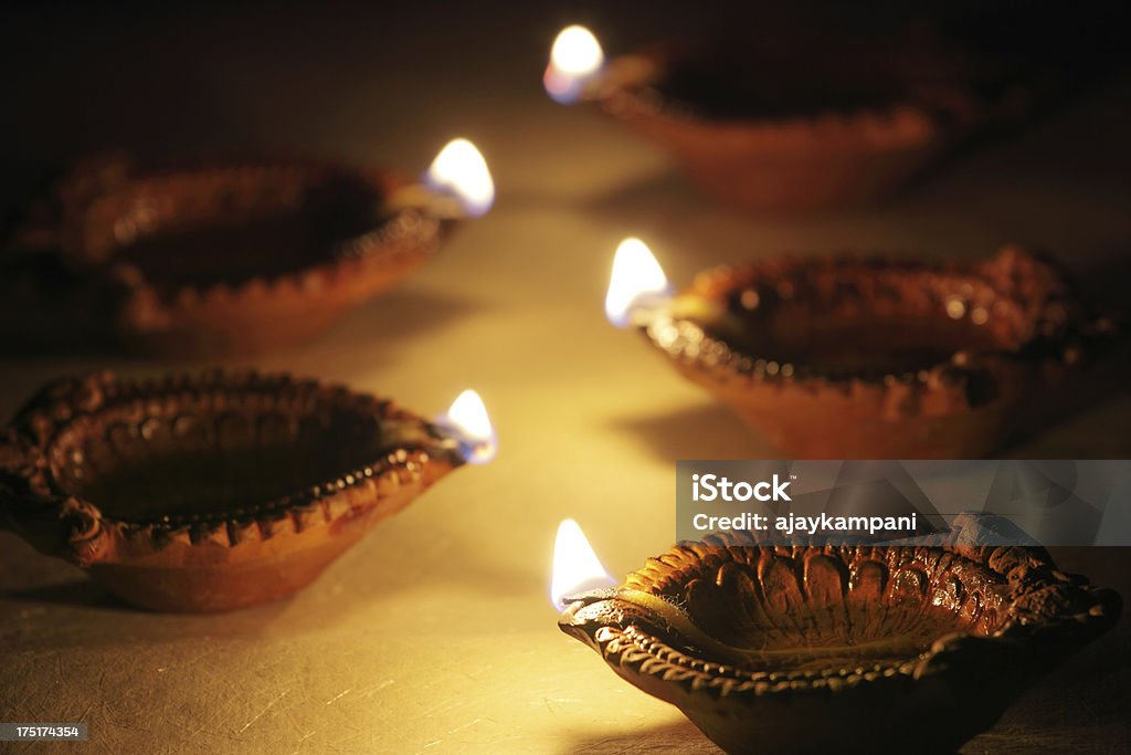 Diya - Celebrations of diwali Celebrations of diwali - a traditional festival of india celebrated with fire Celebration Event Stock Photo