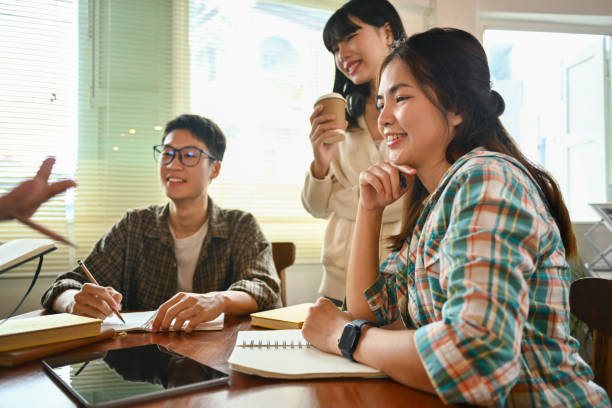 istock Creative business team brainstorming and preparing presentation at co working space in modern office 1751744777