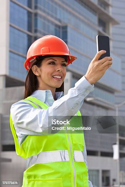 Female Architect At Construction Site Stock Photo - Download Image Now - Adult, Adults Only, Agreement